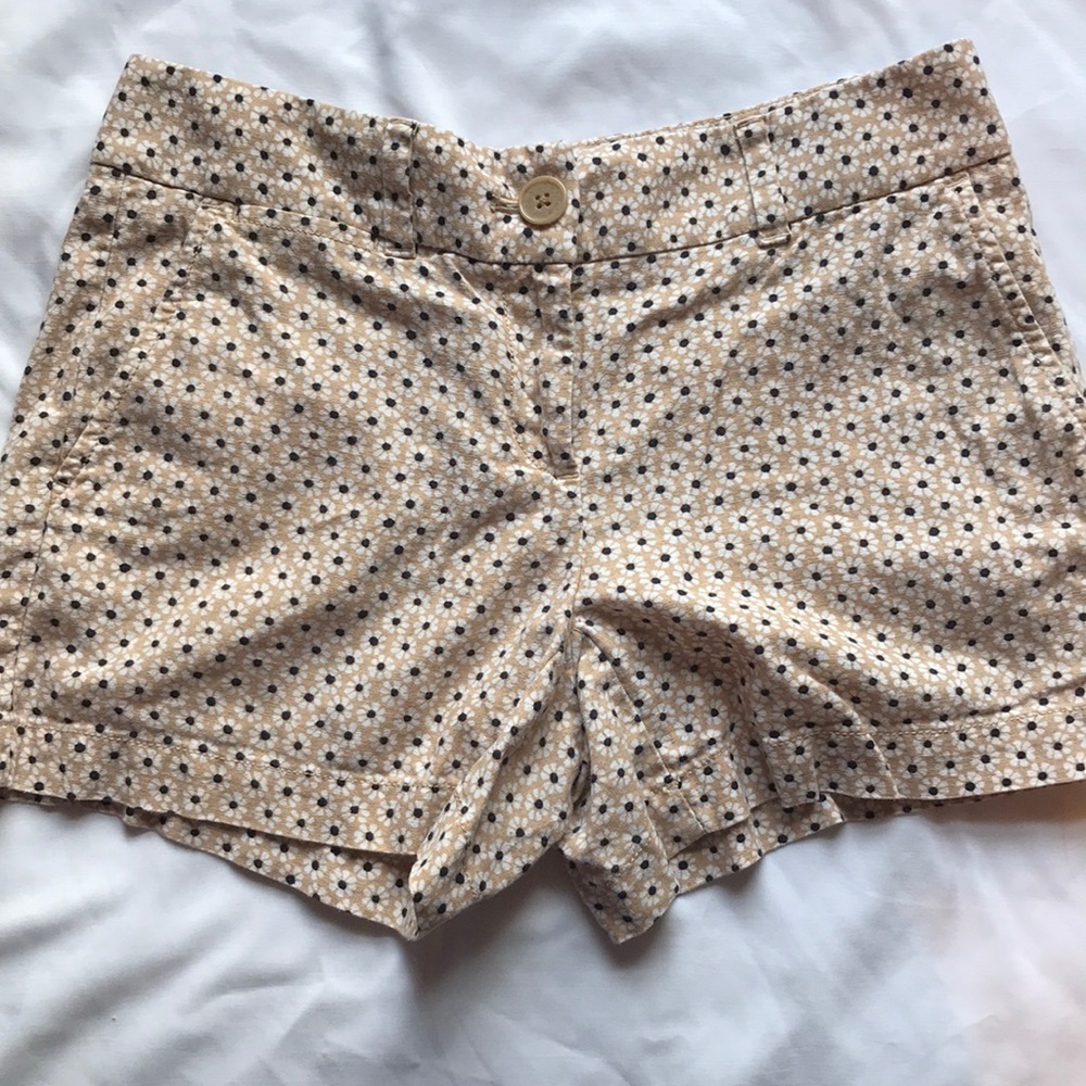 Tan flower patterned Loft shorts.